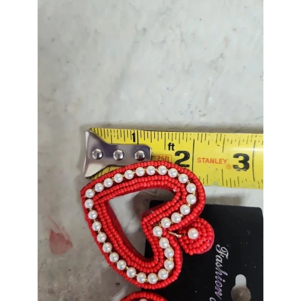 Love and  kisses red heart with pearl accent